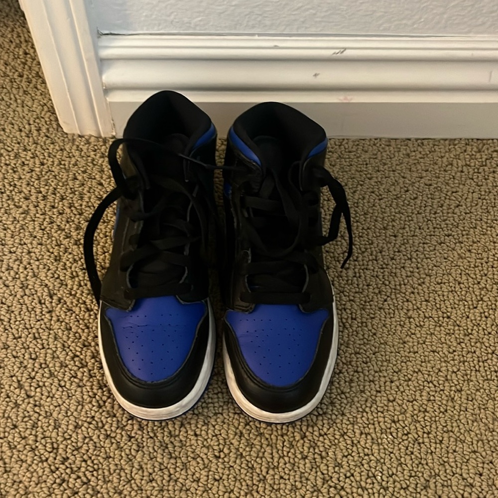 Size 5Y navy blue Nike Jordan’s